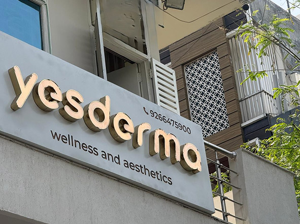 Dermatologist examining a patient's skin