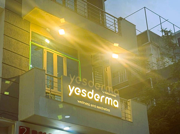 Dermatologist examining a patient's skin